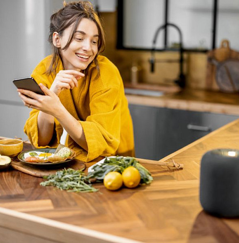 woman using alexa in a smart home