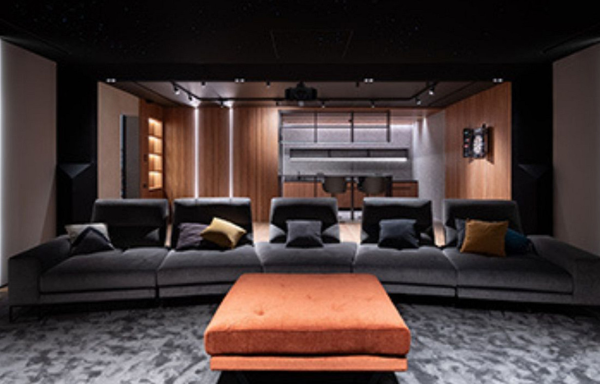 Millenium home theater seating area and large couch