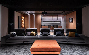 Millenium home theater seating area and large couch