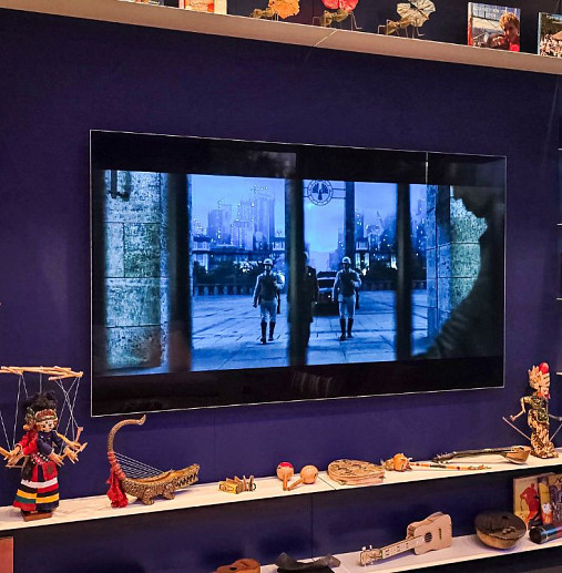 Château Rêve cinema and shelving area