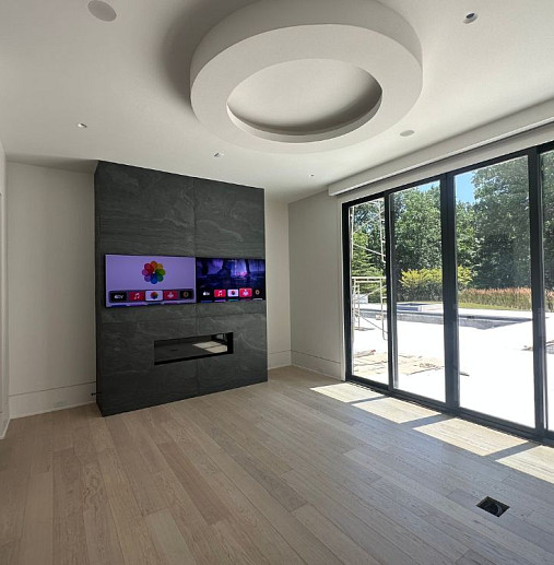 Menlo Integrated Home dual TV and fireplace
