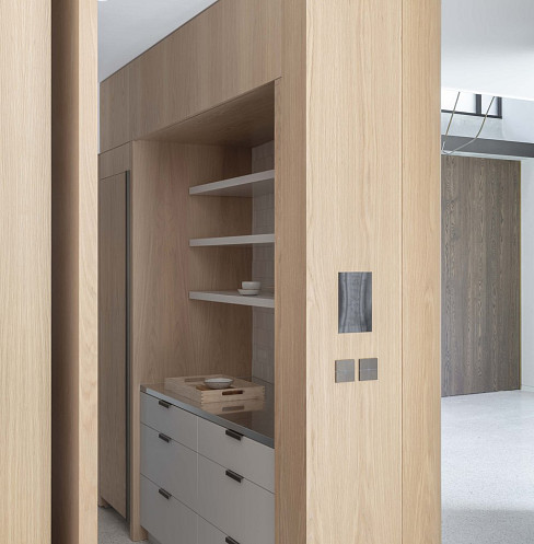 Custom timber joinery with flush-mounted lighting and shading control keypads