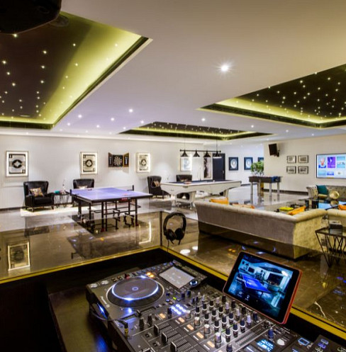 games room with dj set