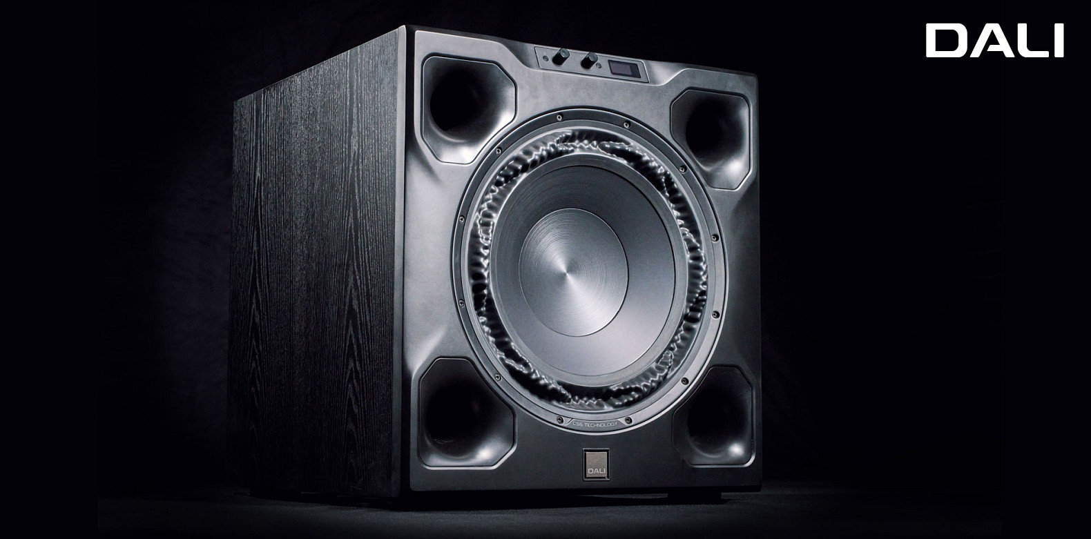 DALI SUB V-16 F subwoofer with its 16-inch driver exposed against a black background