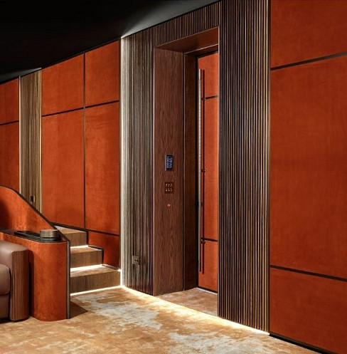 Soundproof home cinema doorway finished with timber and acoustic wall panels