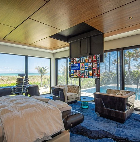 Smart bedroom entertainment system with motorised television lift