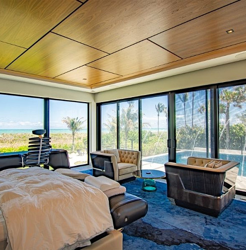 Smart bedroom with concealed speakers, automated shading and integrated controls