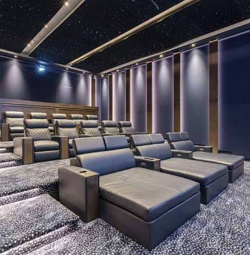 Luxury cinema seating for up to 20 guests beneath a fibre-optic star ceiling