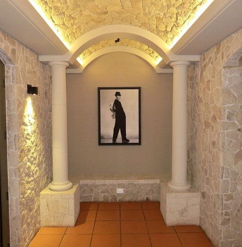 Decorative entrance to a converted basement home cinema