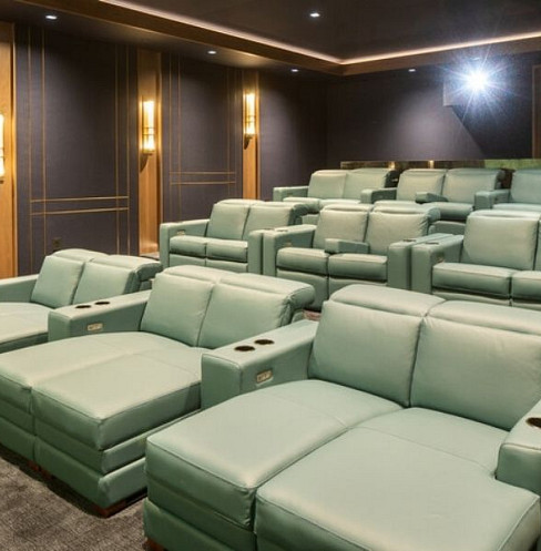 Tiered D-Box cinema seating within an 11.6.8 Dolby Atmos theatre