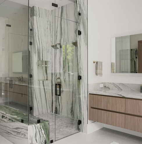 marble walk in shower and bathroom