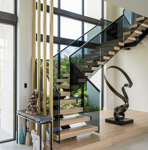 Modern staircase with discreet lighting and whole-home automation