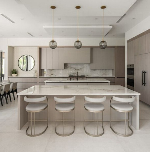 Open-plan smart kitchen with integrated lighting and audio
