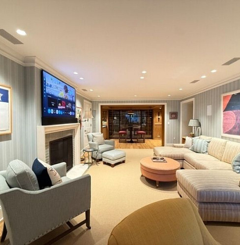 Living room with voice-controlled lighting, shading, audio and security