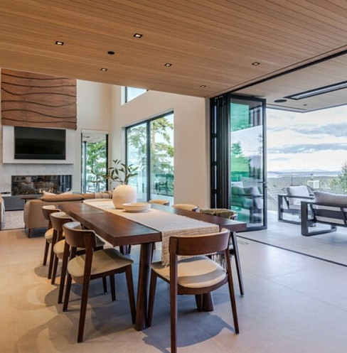 living dining room with large tv