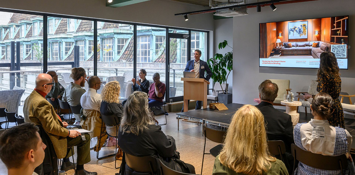 Presenter speaking to attendees at a smart home industry event